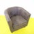 Brown Leather Armchair with Exposed Stitching and Wooden Legs