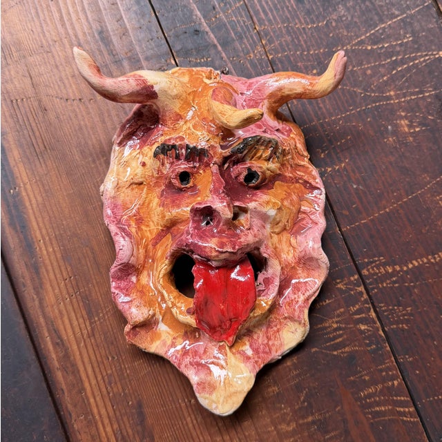 An expressive ceramic wall mask from Seminara, the well-known ceramic village in Calabria, made by Gennaro Condurso, a...