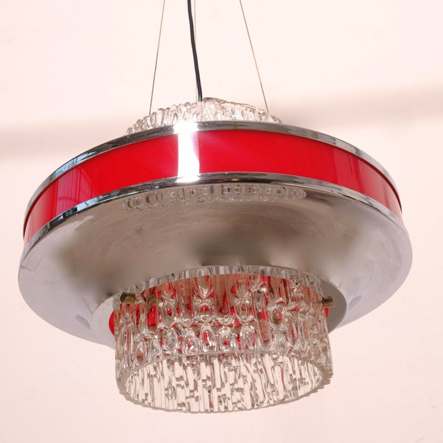 Beautiful glass, acrylic glass, and metal pendant light, original from the 1970s. In working order. Dimensions: Height...