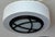 Design Plus Gallery presents an Orbit Drum Flush Mount Ceiling Light. The circular fixture has an ivory fabric drum shade...