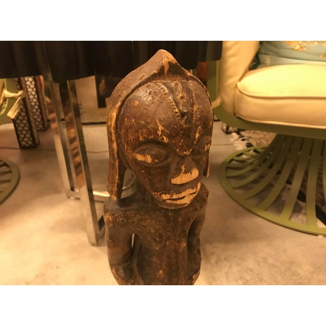 This is an interesting vintage, African ceremonial male figure, from the Fang Tribe. He is nicely embellished with hand-...
