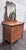 This is a gorgeous antique Victorian quarter-sawn tiger oak serpentine dresser with beveled swivel mirror, circa early...