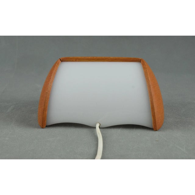 The lamp has model number 716. It was designed by Östen Kristiansson on 14 January 1959. Rare model. This piece has an...
