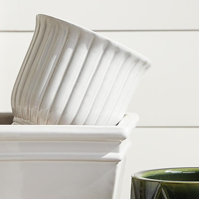 This durable earthenware pot is designed for the outdoors, but is equally as beautiful indoors. From the depth of the...