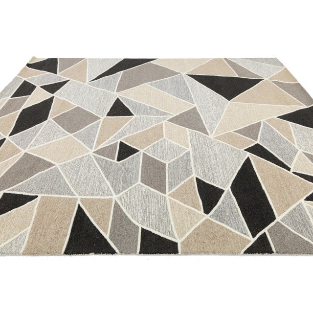 Elevate your space with this striking Modern Geometric Hand-Tufted Wool Rug. Featuring a sophisticated "shattered" mosaic...