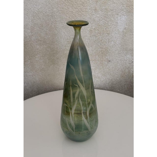 An exceptional, handcrafted studio glass vase by renowned German glass artist Wolfgang Schmid, dating from 1982. The vase...
