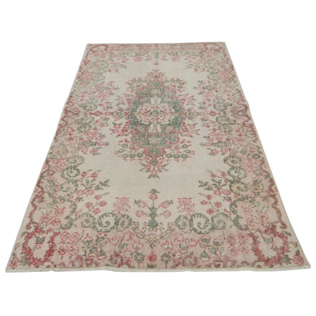 Handknotted vintage rug from Isparta region of Turkey. Approximately 50-60 years old. In very good condition.