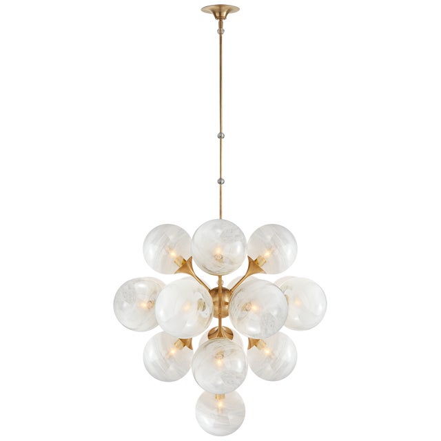 AERIN for Visual Comfort Signature Cristol Large Tiered Chandelier in Hand-Rubbed Antique Brass with White Strie Glass For Sale