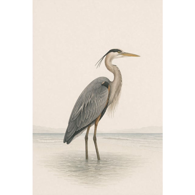 A refined coastal diptych featuring a great blue heron and a white egret standing in tranquil shoreline waters. Designed...