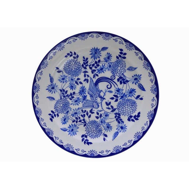 This charming set of eight Rosenthal salad plates features a blue-and-white design of a bird of paradise surrounded by...