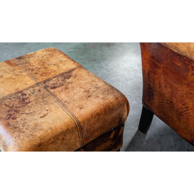 1970s Vintage Art Deco Distressed Cognac Leather Wingback Chair & Ottoman For Sale - Image 16 of 16
