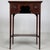 A beautifully crafted early 20th-century English Edwardian side table, finely constructed in mahogany and distinguished by...