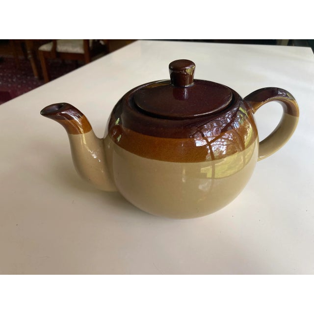 Vintage brown and taupe colors ceramic teapot 9"L X 5"H X 5"W , Excellent condition.