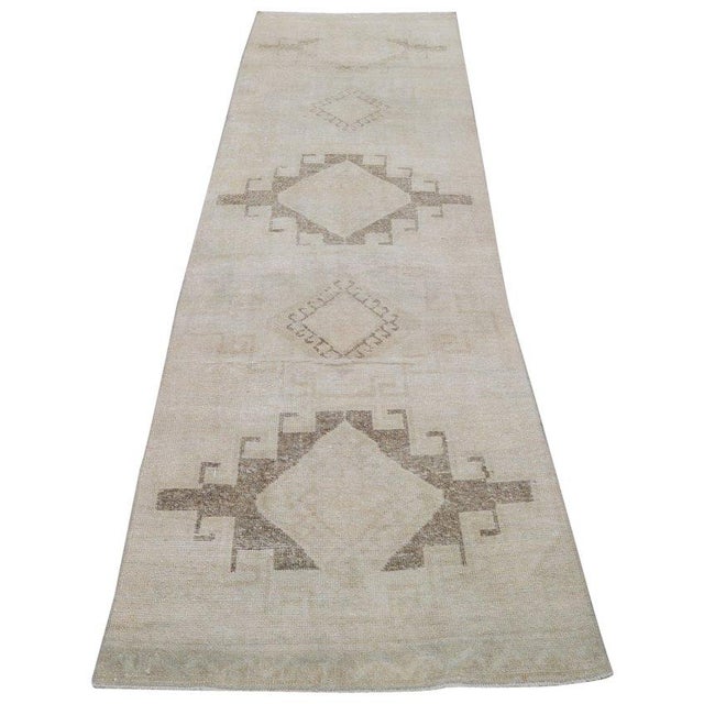 Hand-knotted with care using traditional rug-making techniques, this wool rug blends timeless craftsmanship with a modern...