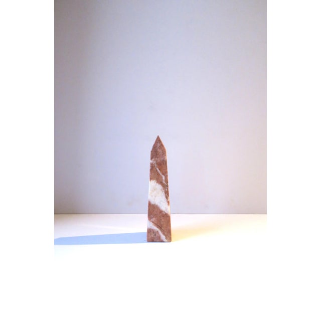 A beautiful and substantial pink and white marble Obelisk, in the modern style, circa mid-20th century, Italy. Marble is...