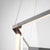 Geometric lightness defines this suspended hexagonal chandelier by Johanna Grawunder, where a minimal tubular frame...