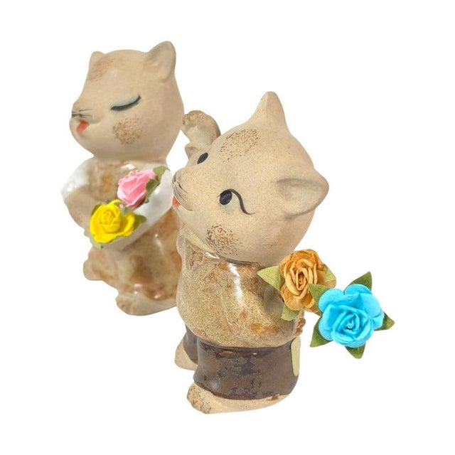 This is a vintage pair of UCTCI Japan ceramic cat flower holders with speckled, textured bodies and colorful glazed...