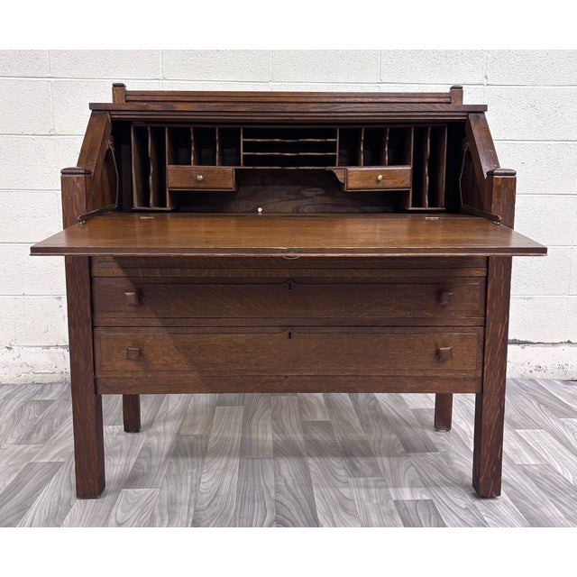This is a stunning antique early 1900s Arts & Crafts Mission Tiger Oak secretary desk manufactured by The Cron and Kills...