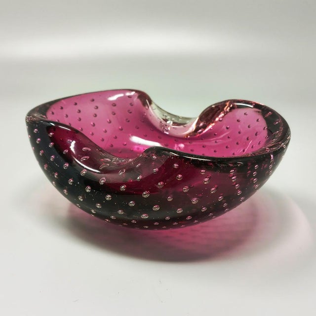 This mid-century modern ashtray or catchall, designed by the legendary Flavio Poli, was hand-blown in Murano, Italy,...