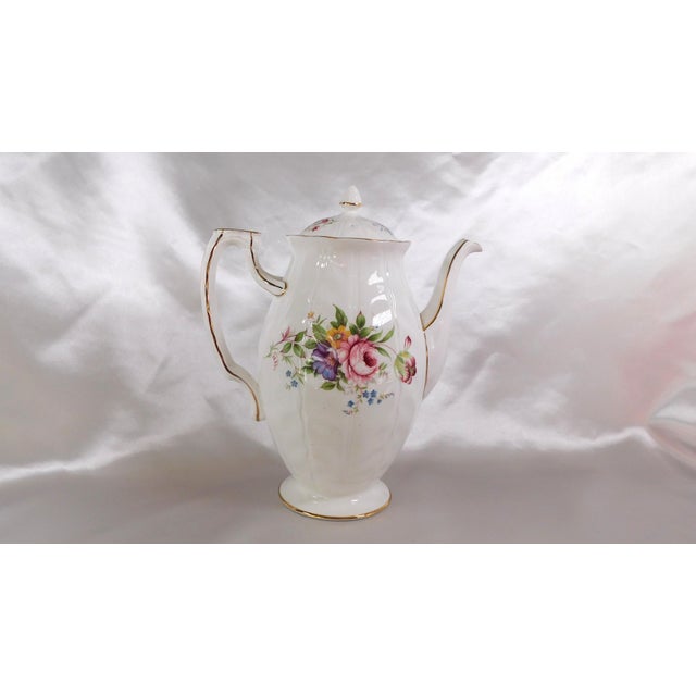 This is a ridged Aynsley Coffee Pot in Aynsley Spray. It is white with a multicolor floral design on rthe front and back,...