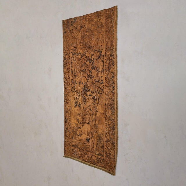 A late 19th-century French tapestry, hand-woven in wool and later backed in cotton for preservation. Rendered in a...