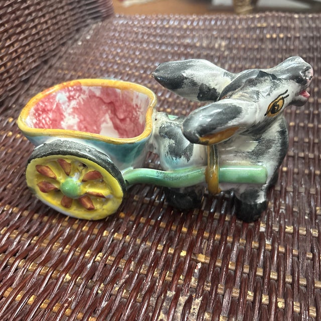 Small Italian Pottery Donkey Planter or Candy Dish. This is little grey donkey with a green and yellow wagon and a pink...