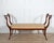 An elegant Neapolitan Empire bench crafted in solid mahogany, dating to the second half of the 19th century. Exemplifying...
