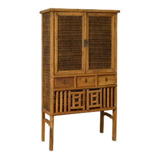 Indonesian Cabinet with Rattan Doors, Drawers and Fretwork Sliding Panels For Sale