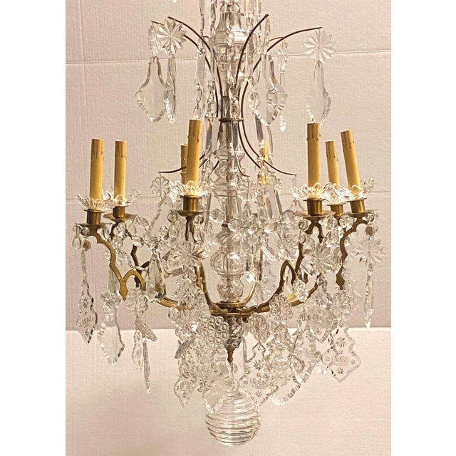 French Louis XVI style bronze and crystal cage form chandelier attributed to Baccarat crystal bobeches are signed Baccarat.