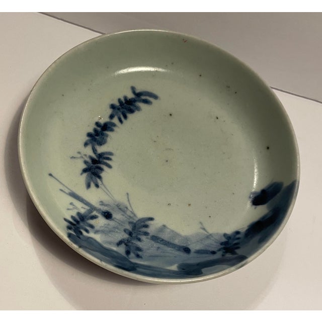 1930s shallow blue and off white Chinese shallow bowl / deep plate unmarked with blue decoration on the back. See photos....
