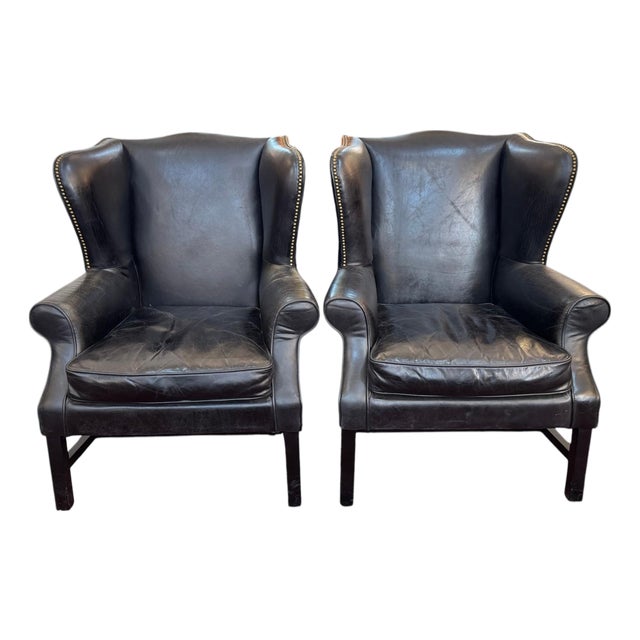 Pair of Vintage Black Leather Wingback Chairs With Brass Nailhead Trim For Sale