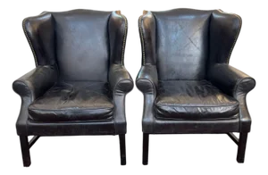 Pair of Vintage Black Leather Wingback Chairs With Brass Nailhead Trim