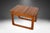 A beautiful teak end side table by Tarm Stole Mobelfabrik A/S. Featuring stunning, signature sculptural design, with...