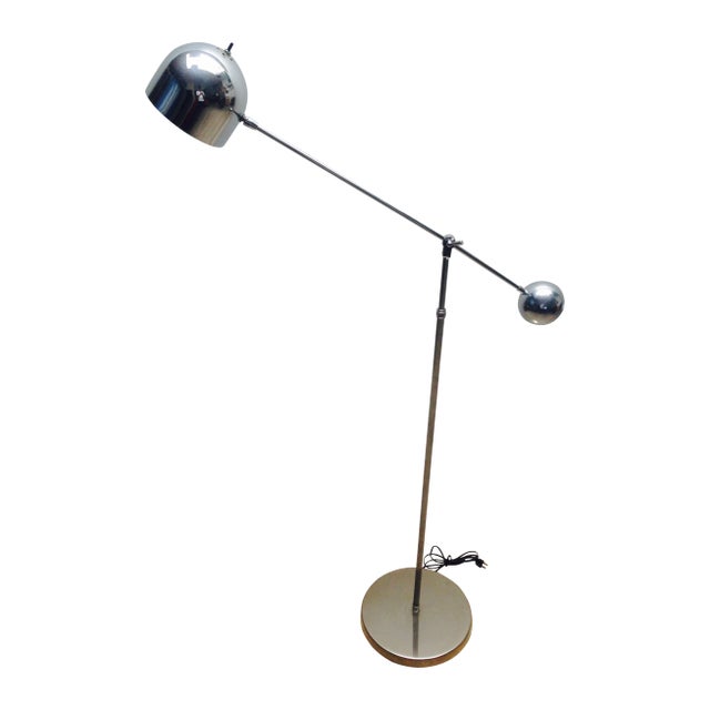 Striking and highly functional, this vintage Mid-Century Modern chrome floor lamp channels the iconic aesthetic of...