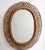 Rattan wall mirror (circa 1960s) in that inimitable italian style that is so loved. This mirror has a complex weave of...