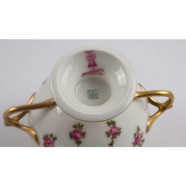 An exceptional antique French porcelain bouillon cup by Tressemann & Vogt (T&V) of Limoges, beautifully decorated for the...