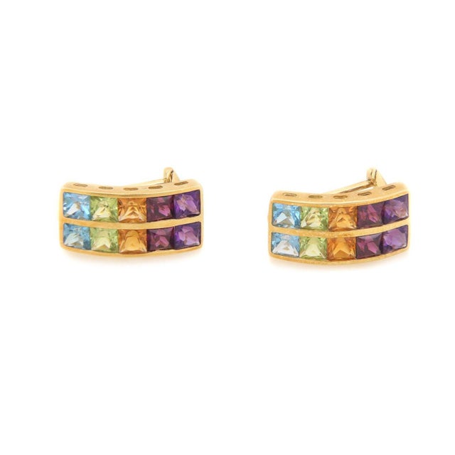 This is a fabulous pair of earrings, crafted from 18k yellow gold featuring a 20mm long wide curved shape with double row...