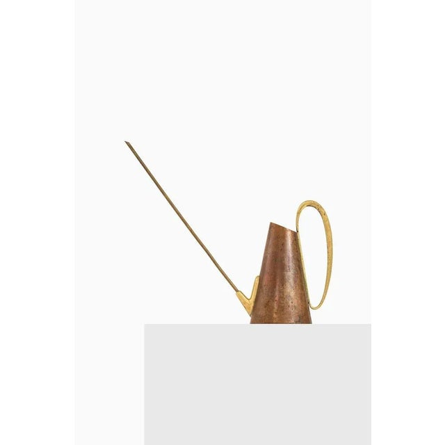 Watering can in brass and copper by carl auböck, 1950's additional information: material: brass and copper style: mid...