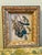 A beautifully framed ornithological print depicting the Florida Jay among fruiting branches, rendered in the richly...