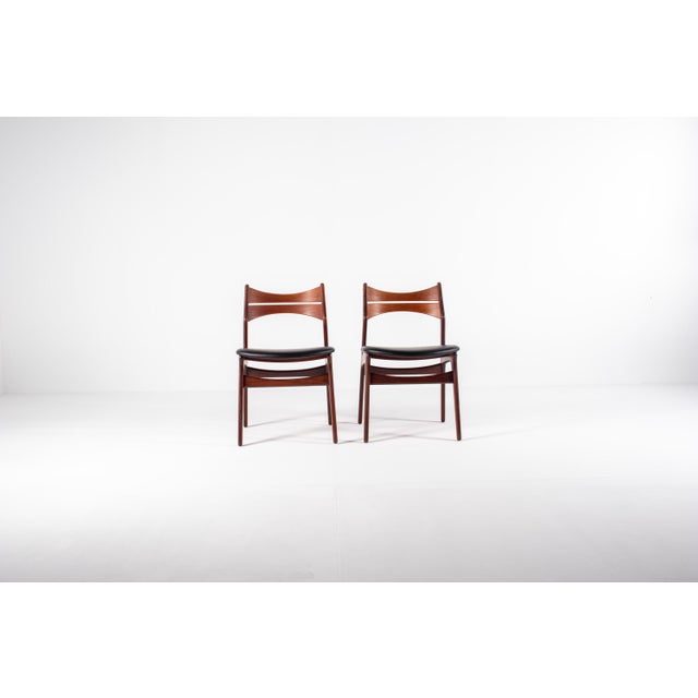 Beautiful set of two original Danish mid-century modern dining chairs designed by Erik Buch, Model 310, produced in...