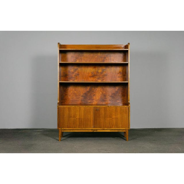 Item: Bookcase Period & Style: Mid-Century - 1950s/1960s Features: - Elegant and practical piece of furniture with...