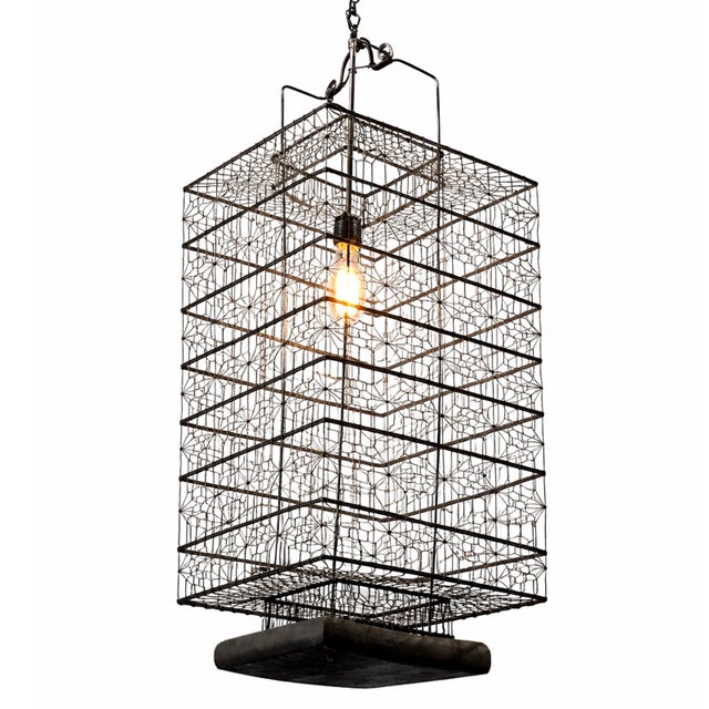 Original vintage fishing boat lantern updated with intricate wire work. Black finish wood bottom. Wonderful piece...