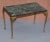 We are delighted to this sublime pair of circa 1900 bronzed frame side tables with thick solid green marble tops These are...