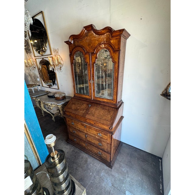This 19th c. Italian Walnut Secretary is a unique and elegant piece of antique furniture. Made from high-quality walnut,...