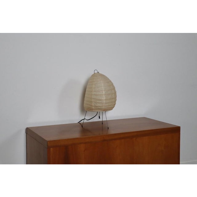 Akari model 1n light sculpture by isamu noguchi. The shade is made from handmade washi paper and bamboo ribs with noguchi...
