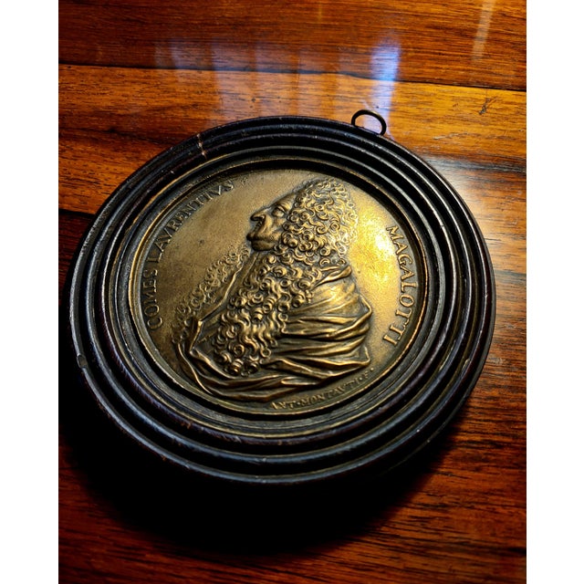 A striking and intellectually compelling 19th-century grand tour cast bronze commemorative medal plaque depicting the...