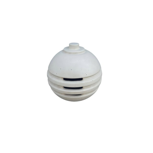 The vase is available in white or wheat-beige color This piece is attributed to the mentioned designer/maker. It has no...