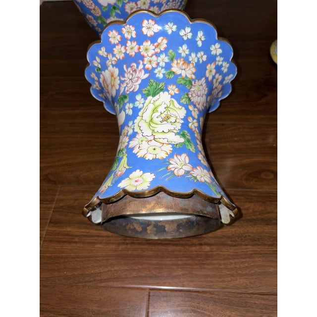 An exceptional and impressive pair of Chinese Canton Enamel (Guangfalang) two-section floor/table vases, dating to the...