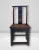 This exceptional pair of 19th-century Chinese yoke-back accent chairs is expertly hand-carved from yumu wood, celebrated...