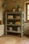 This shelf on feet in weathered solid wood is the perfect example of timeless furniture combining simplicity and...